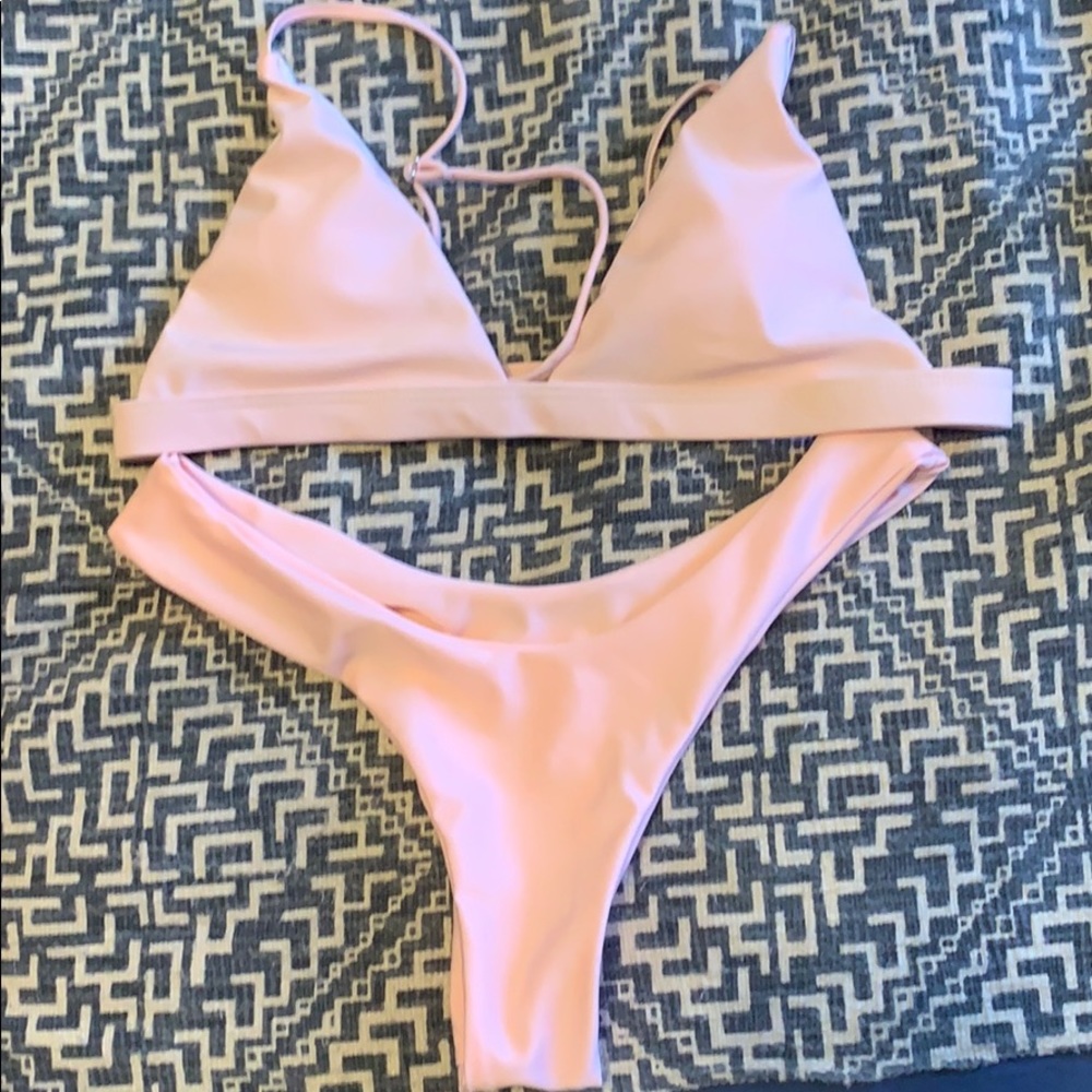 Light Pink swimsuit. NWOT.